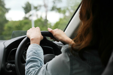 woman driving car, hand hold steering wheel