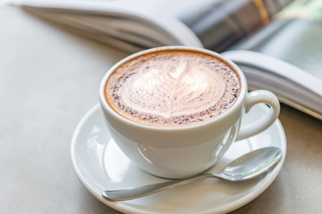 cup of coffee with book