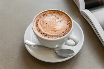 cup of coffee with book