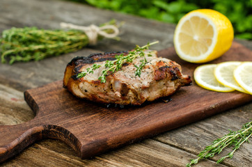 Pork steak with thyme and lemon