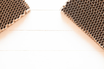 Honeycomb cardboard. Geometric background with copyspace. Recyclable kraft paper cardboard.