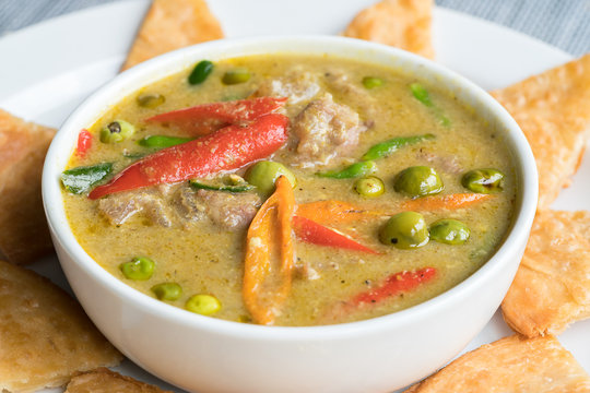 Green Beef Curry traditional Thai Food served with Roti Halal Food in Thailand
