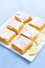 Lemon squares on plate