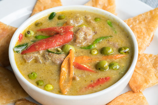 Green Beef Curry traditional Thai Food served with Roti Halal Food in Thailand

