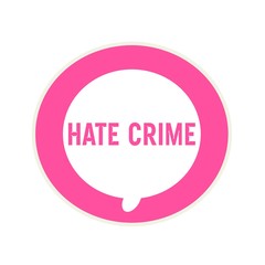 HATE CRIME pink wording on Circular white speech bubble