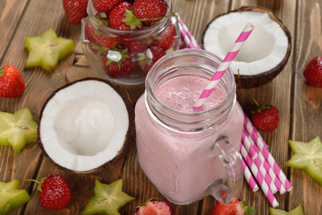 Cocktail with coconut milk and strawberries