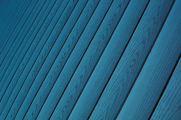 Blue wooden background. Diagonal boards. Wood texture.