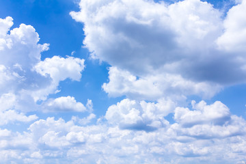 White clouds in the blue sky.