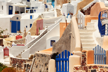 Close up of the narrow streets, small doors and steep stairs of Oia town, Santorini, Greece