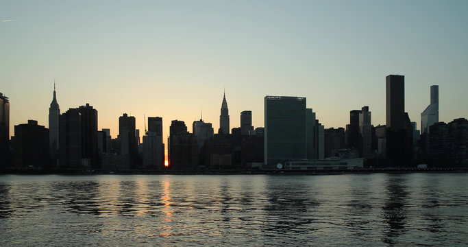 New York City Manhattan evening sunset buildings skyline at Manhattanhenge