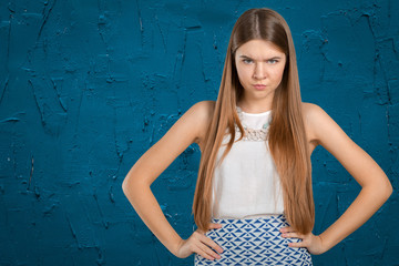 Fototapeta premium Young beautiful frustrated angry woman
