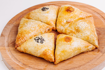 Delicious samosa pies with meat on plate. Menu, restaurant, reci
