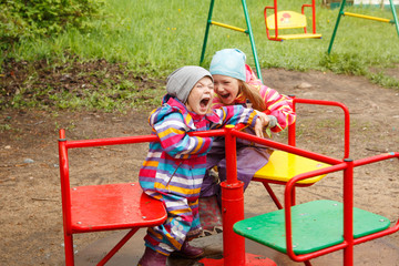 Little girls laughing in the Playground