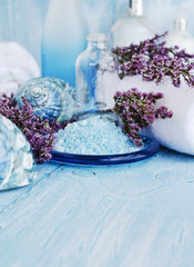 flowers lying on and candle Spa set