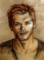 Naklejka na ściany i meble Illustration. Portrait of a young man with short hair. En face . Sanguine, charcoal, pastel.