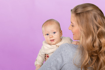 Happy young mother and her son