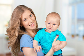 Happy young mother and her son