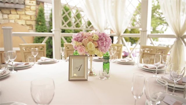Decorated table for a wedding dinner, beautiful table setting outdoors