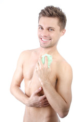 Young handsome guy in the shower. 