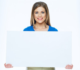 Smiling woman holding advertising board
