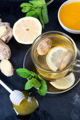 Black tea with ginger, a lemon and mint
