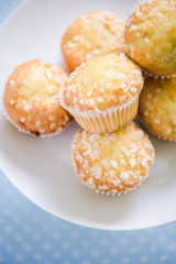 Lemon muffins stack on serving platter