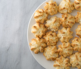 Close view of sugar free coconut macaroons on a plate