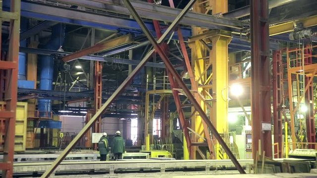 Industrial interior of a huge plant building. Inside view. HD.