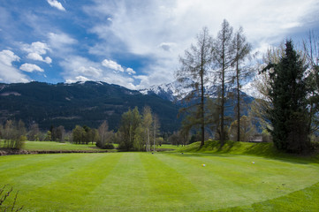 Fototapeta na wymiar Golf course in mountains