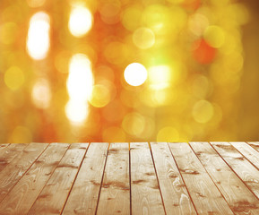 Wooden table in front of blurred bokeh background