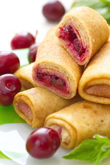 Pancakes with fresh cherries