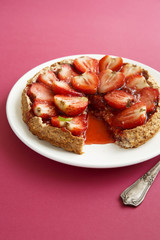 Obraz na płótnie Canvas Gluten free strawberry and almond tart