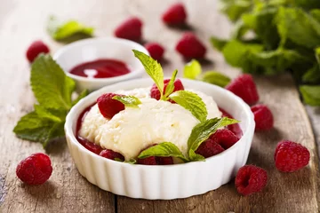 Gordijnen Light dessert with champagne and raspberry sauce © marysckin