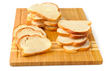 Fototapeta na wymiar cut bread on breadboard