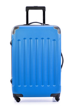 Large blue polycarbonate suitcase isolated on white