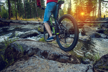 Fototapeta na wymiar Ride on mountain bike at sunset.