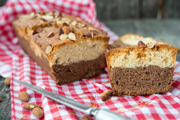 Vanilla cake with chocolate and nuts
