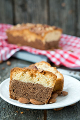 Vanilla cake with chocolate and nuts
