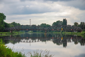 Naklejka premium Industrial river steel gray sky Labe Elbe Vltava bridge