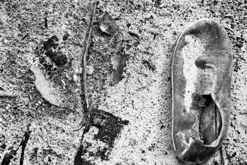 old dirty boots on the street