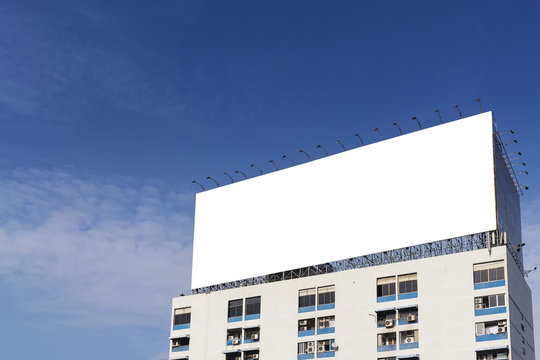 the white background  bill board building on the apatment building with the sky
