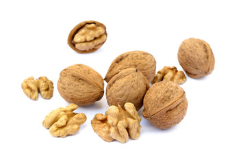 Fresh walnuts with a shell isolated on white background