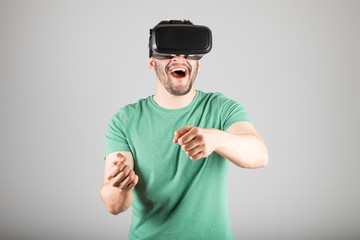 Naklejka premium Man using virtual reality glasses