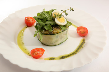 Russian salad on plate with decoration