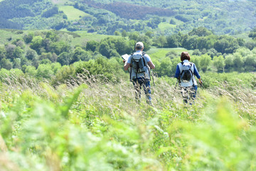 Senior couple on a hiking day in countryside