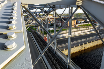 Train "American" bridges over Obvodny canal in St. Petersburg. R