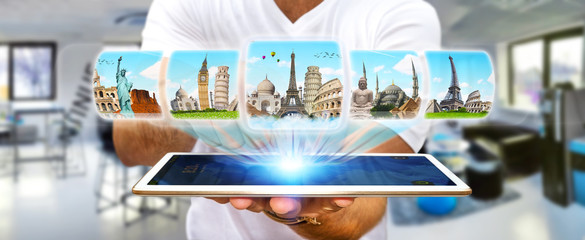 Businessman choosing his holidays between different places of th