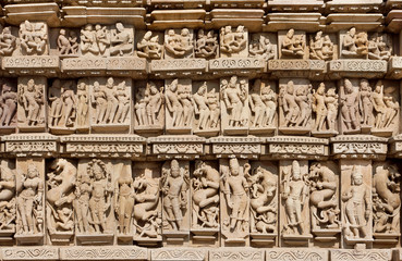 Sculptured background of Khajuraho with Hindu gods and goddess. UNESCO Heritage site