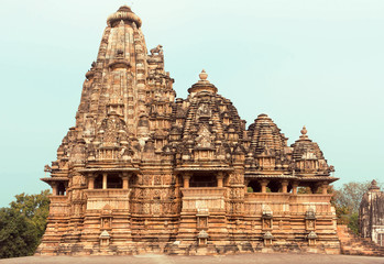 Fototapeta na wymiar Kandariya Mahadeva Temple, structure of the complex of Khajuraho Group of Monuments. India