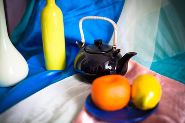 Still-life with bright colored dishes